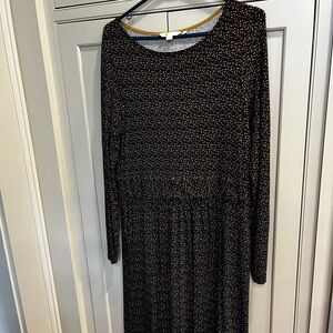 Biden casual black background with brown, white and camel colour  spots all over